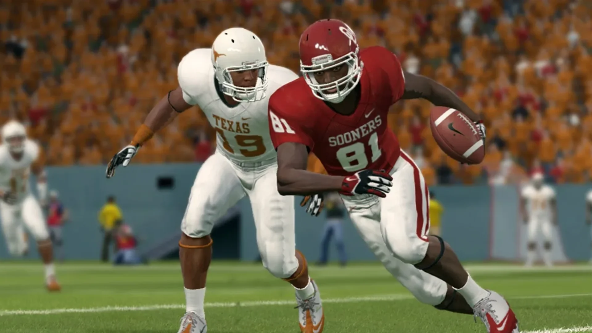 NCAA Football 14 gameplay showing an Oklahoma receiver carrying the ball while a Texas defender gives chase.