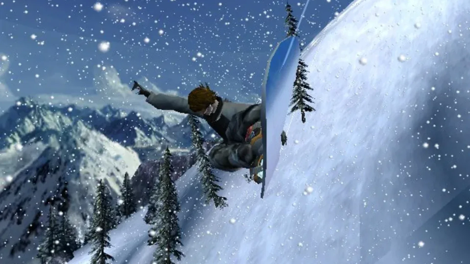 SSX 3 gameplay showing a snowboarder carving down a steep mountain slope during heavy snowfall.