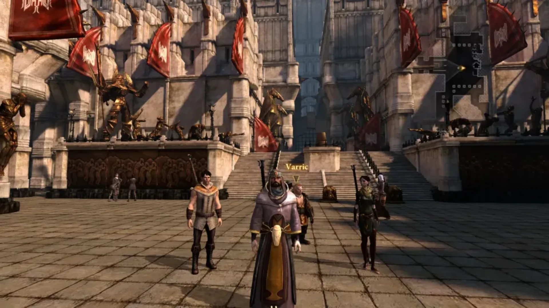Hawke and companions stand in Kirkwall as red banners hang from stone buildings