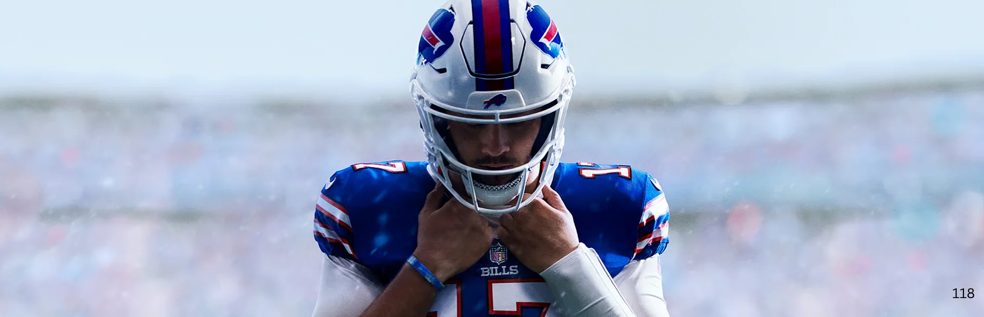 A Buffalo Bills quarterback adjusts his helmet in Madden NFL 27