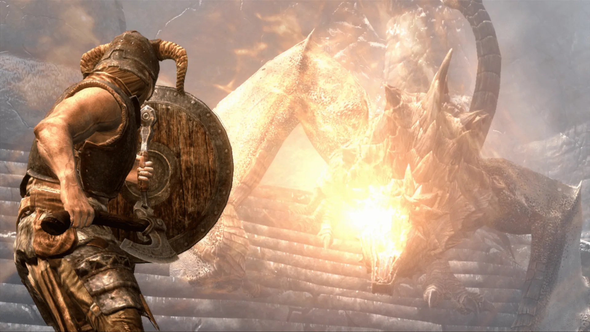 A warrior shields himself from a dragon breathing fire in Skyrim.