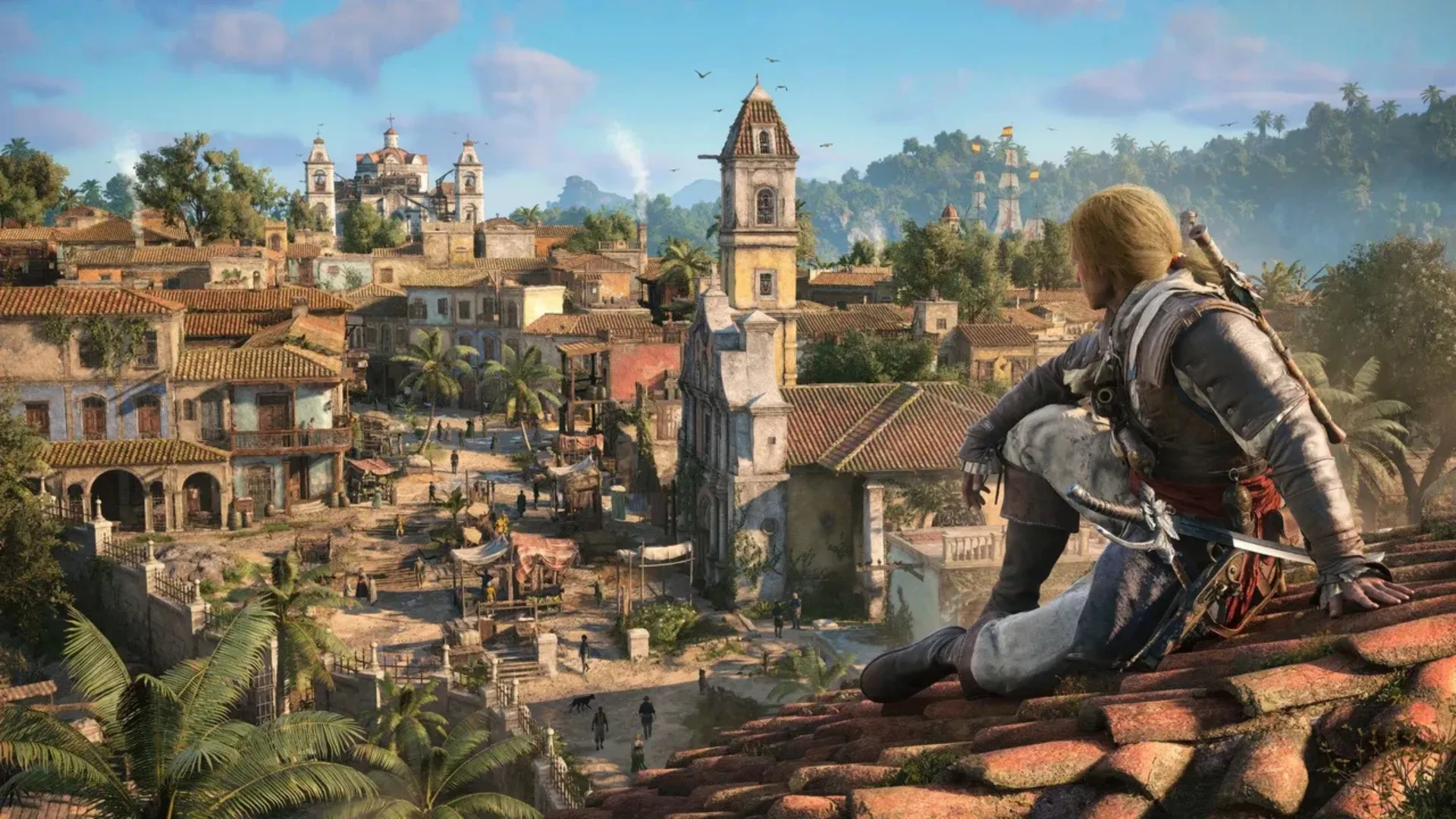 Edward Kenway sits on a rooftop overlooking a colourful Caribbean city in Assassin’s Creed Black Flag Resynced.