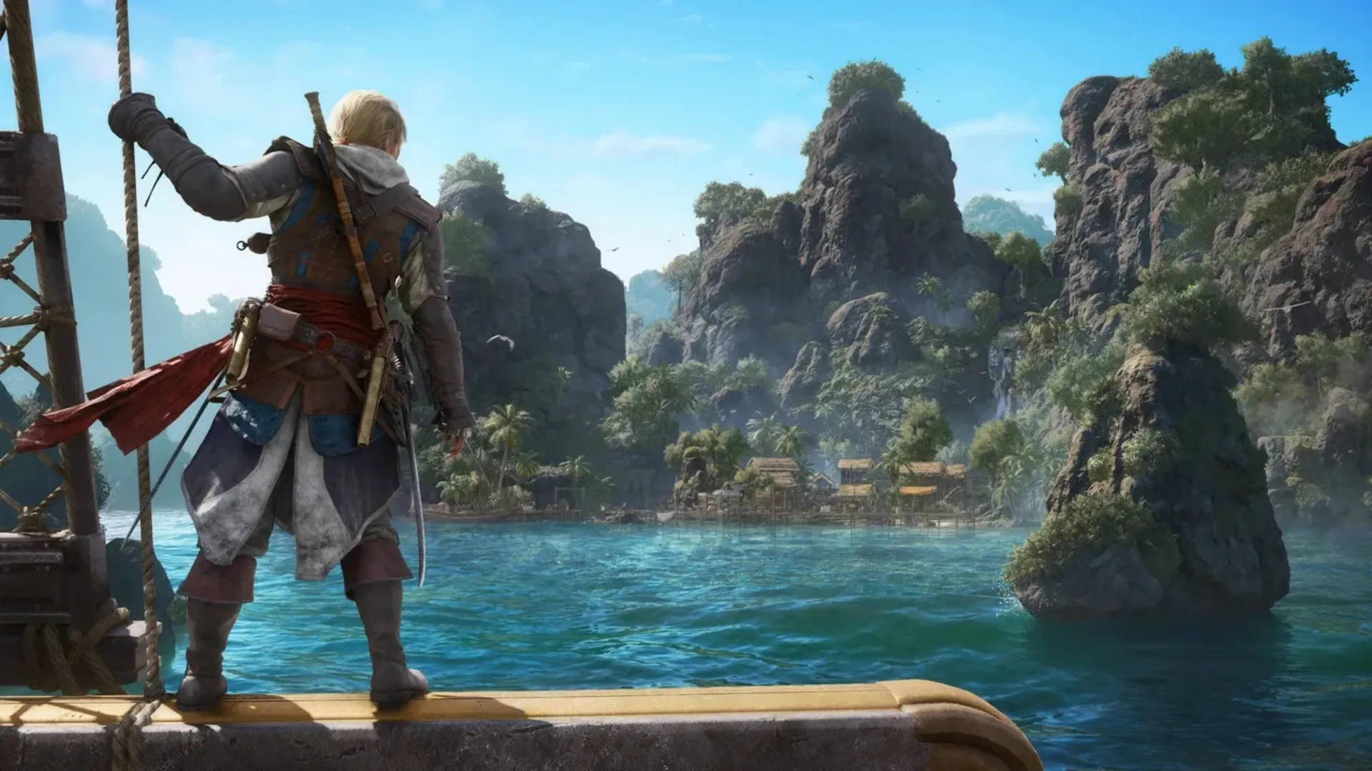 Edward Kenway stands on a ship while looking toward a tropical island in Assassin’s Creed Black Flag Resynced.