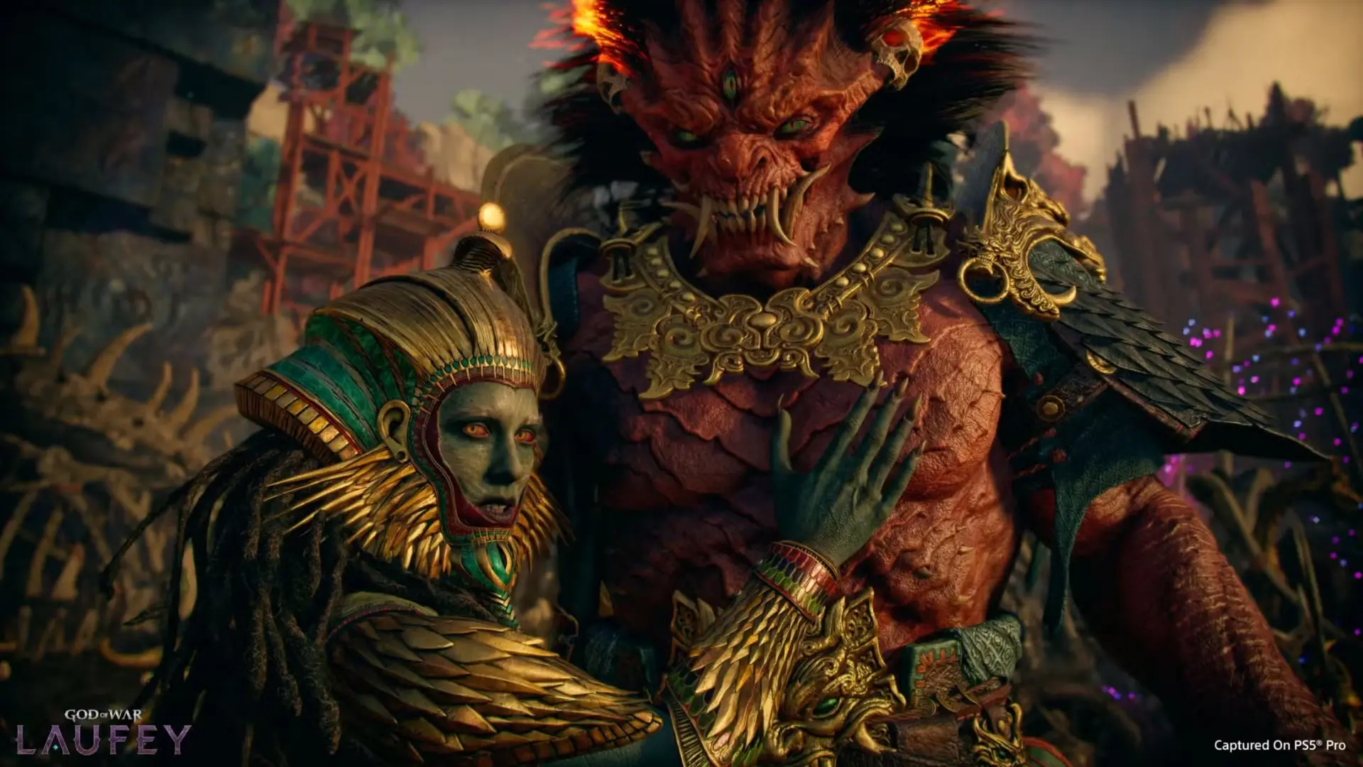 Laufey stands beside an imposing giant creature in a dramatic scene from God of War Laufey