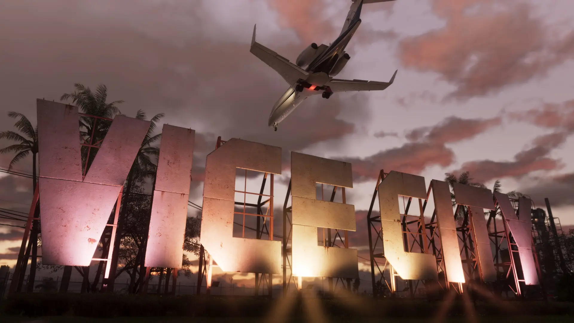 A passenger jet flies over the iconic Vice City sign at sunset in Grand Theft Auto VI, highlighting the game's modern urban setting.