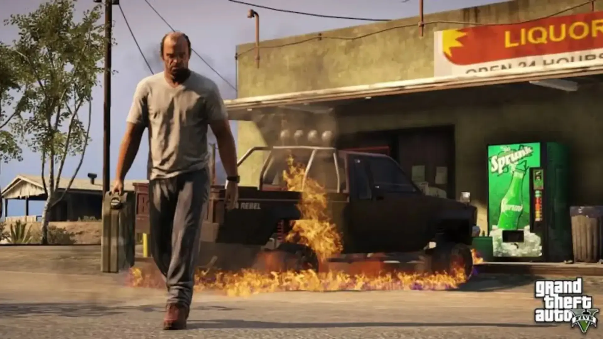 Trevor Phillips walks away from a burning pickup truck while carrying a gas can in Grand Theft Auto V.