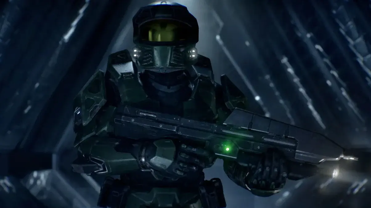Master Chief holding an assault rifle in Halo: Campaign Evolved gameplay screenshot