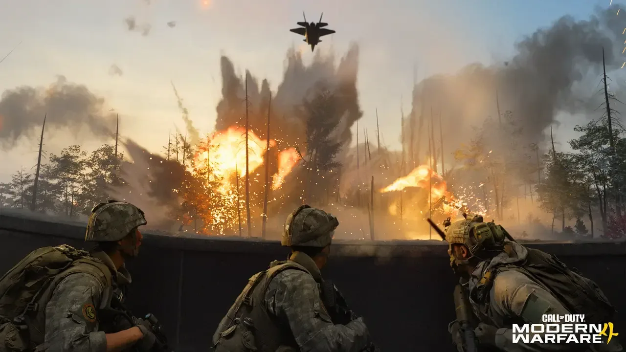 hree soldiers take cover as explosions erupt in a forest and a military jet flies overhead in Call of Duty: Modern Warfare 4.