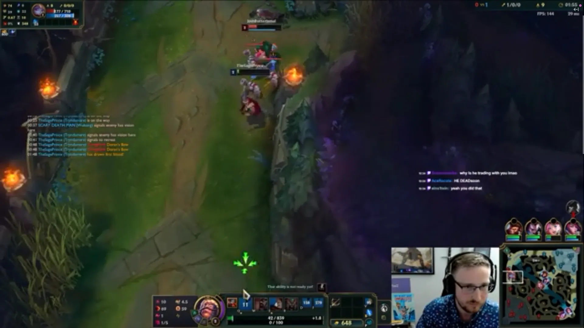 Streamer Foggedftw2 plays Tryndamere in an early League of Legends game, with a webcam overlay in the corner.