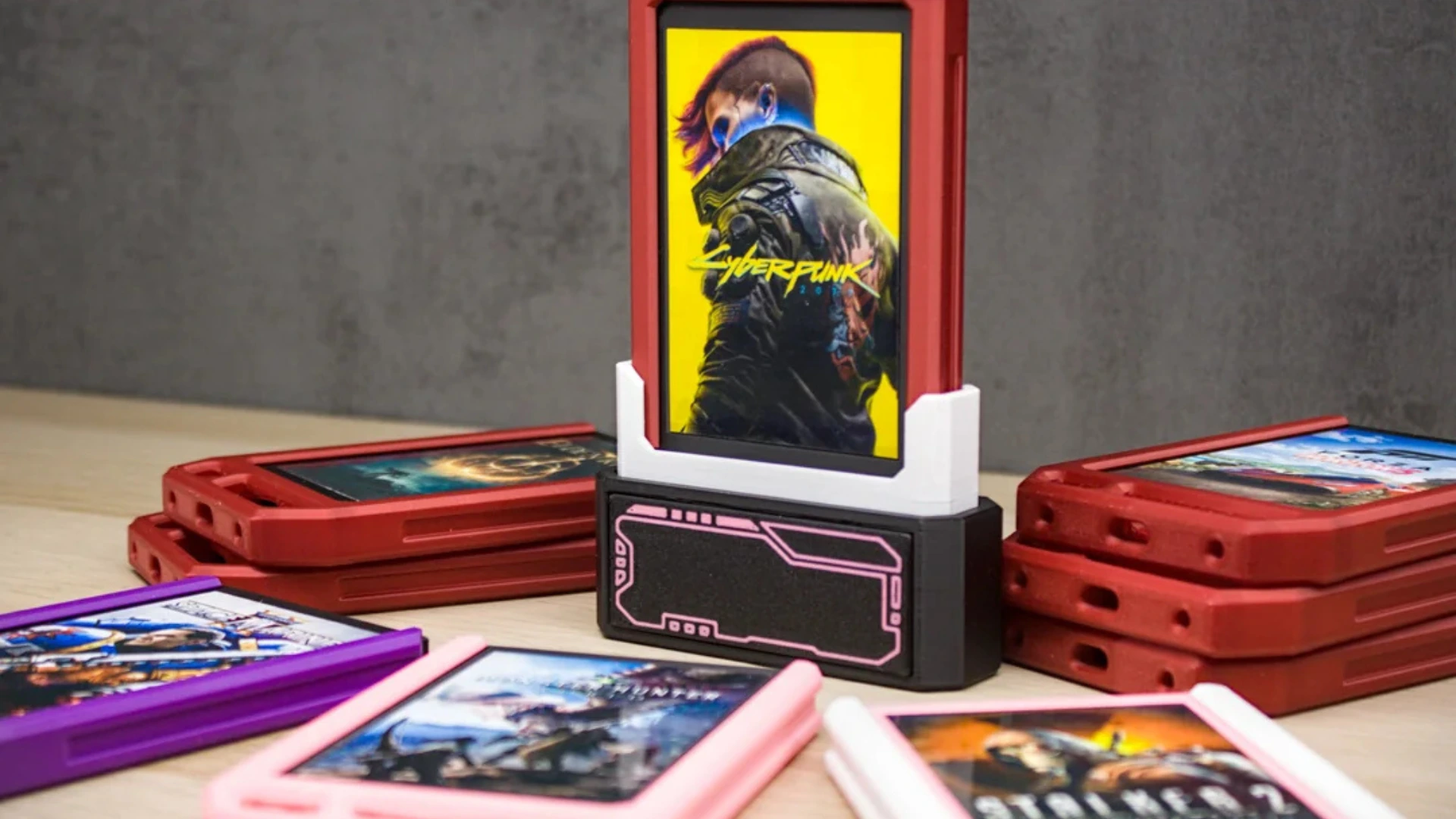 Custom SSD game cartridges with a Cyberpunk 2077 cartridge standing in a dock