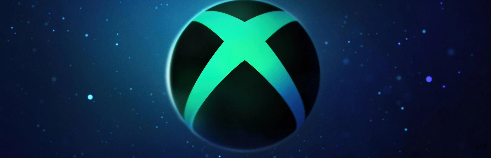 Xbox logo glowing on a dark blue digital background