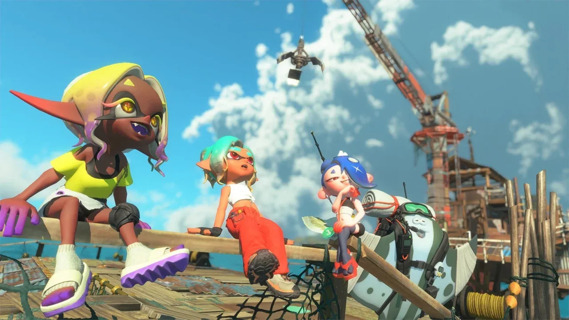 Splatoon Raiders characters sit together near a construction crane under a bright blue sky.