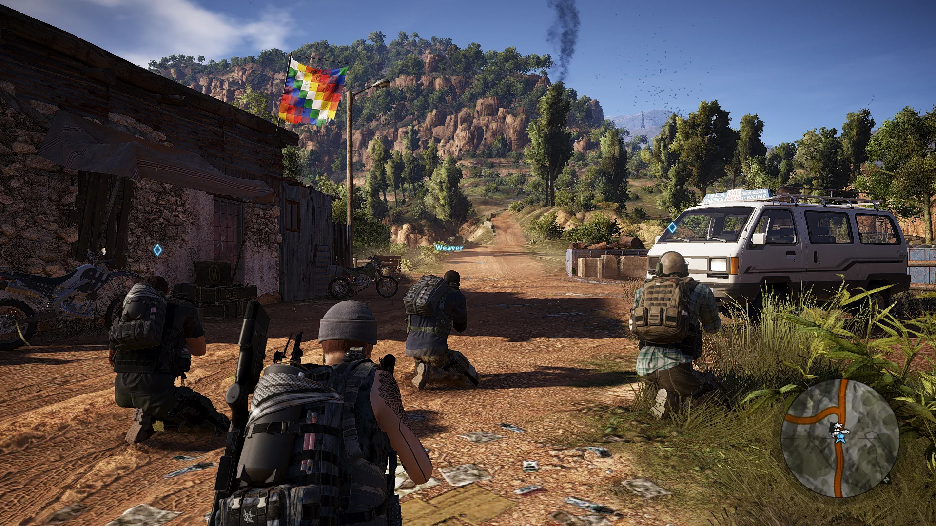 Ghost Recon Wildlands squad members crouch near a van in a rural Bolivian village.