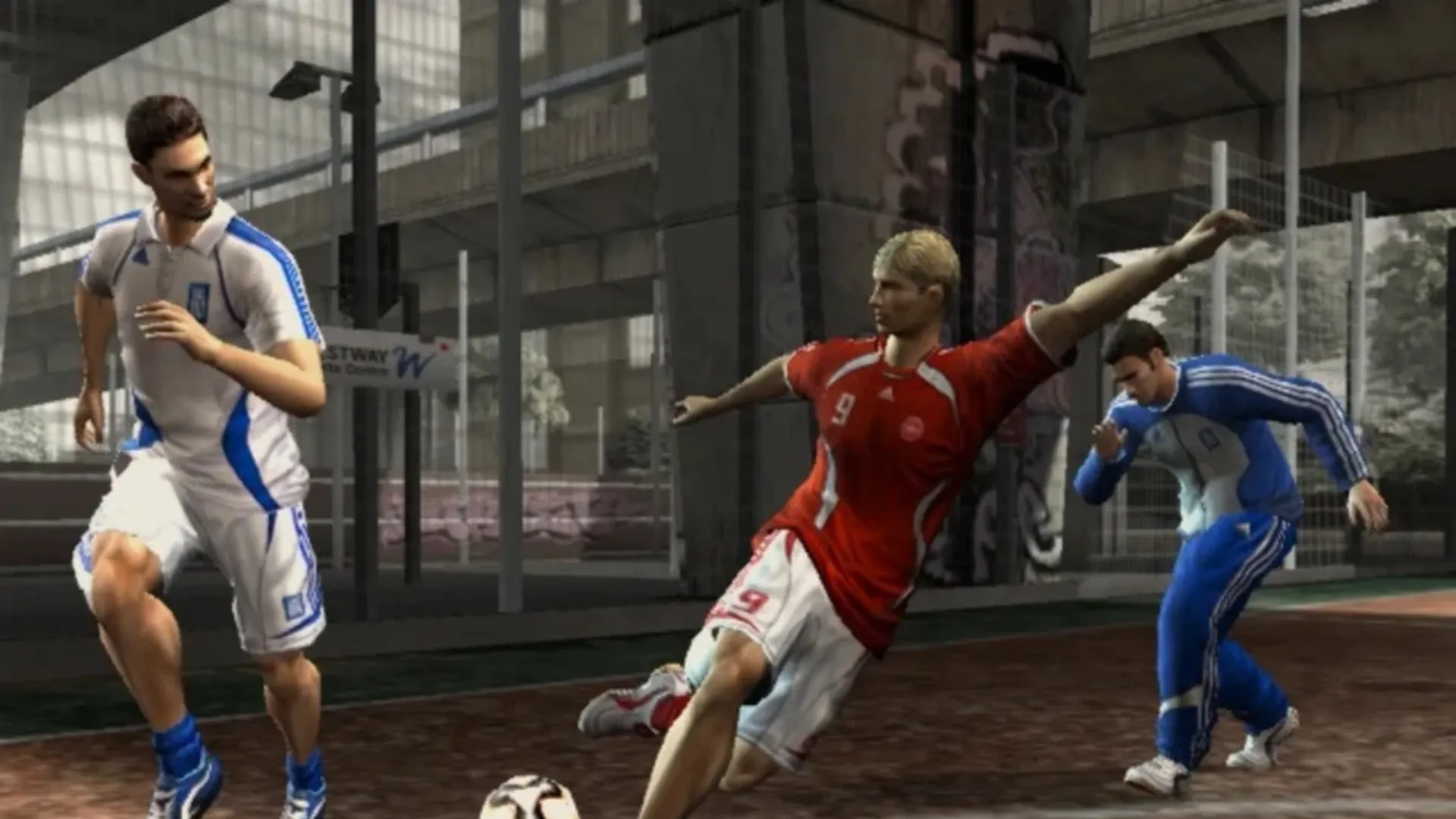 Players in Greece and Denmark kits compete on a concrete court under a graffitied London flyover in FIFA Street 2.