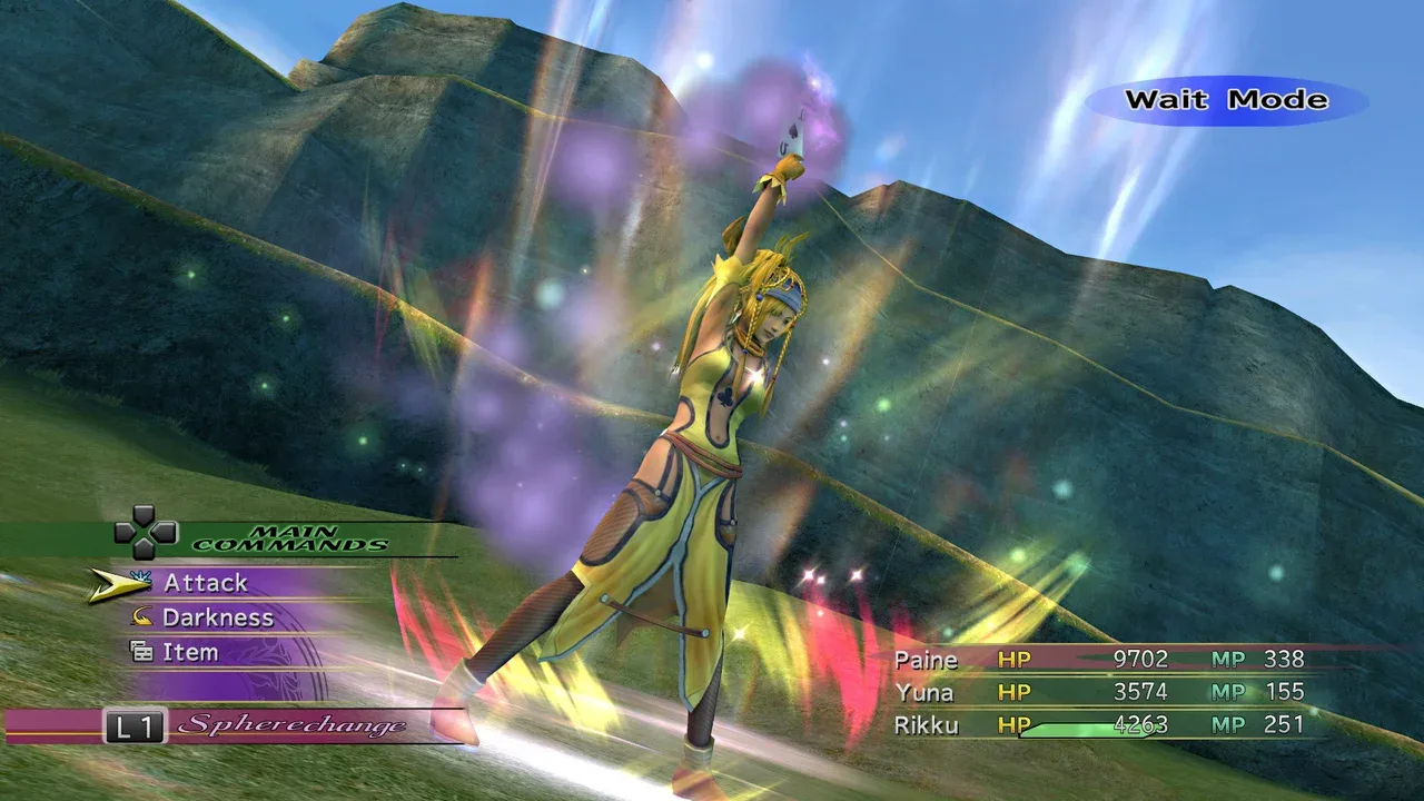 Rikku performs a Spherechange during combat in Final Fantasy X-2 HD Remaster.