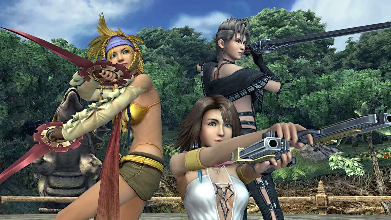 Rikku, Yuna, and Paine pose with their weapons in Final Fantasy X-2 HD Remaster.