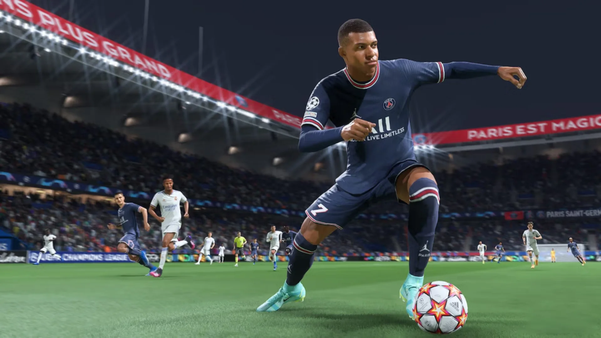 A PSG forward controls the ball during a night match as opposing players chase him inside a crowded stadium.