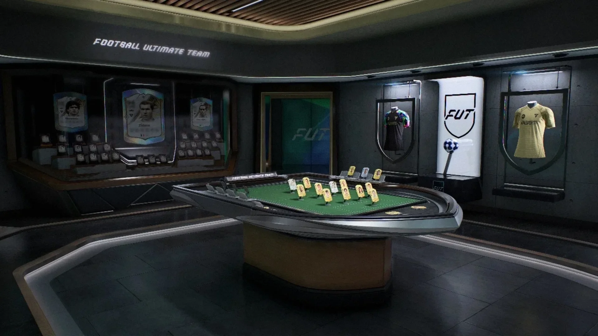 A Football Ultimate Team room displays player cards, football kits, a FUT logo, and a tactical table.