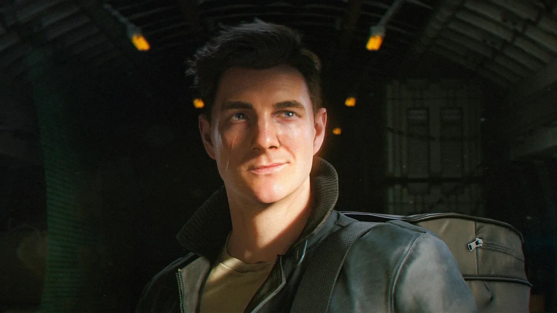 A close-up of the 007 First Light protagonist smiling inside a dimly lit aircraft cabin.