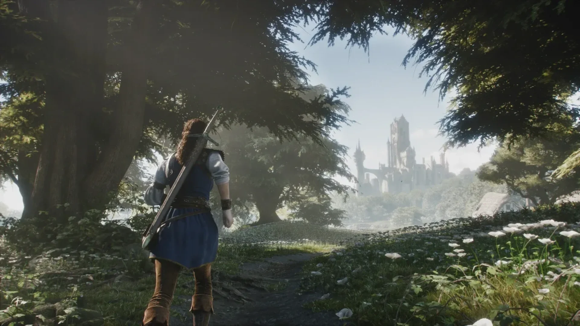 A sword-carrying Fable hero looks toward a distant castle from a sunlit forest.