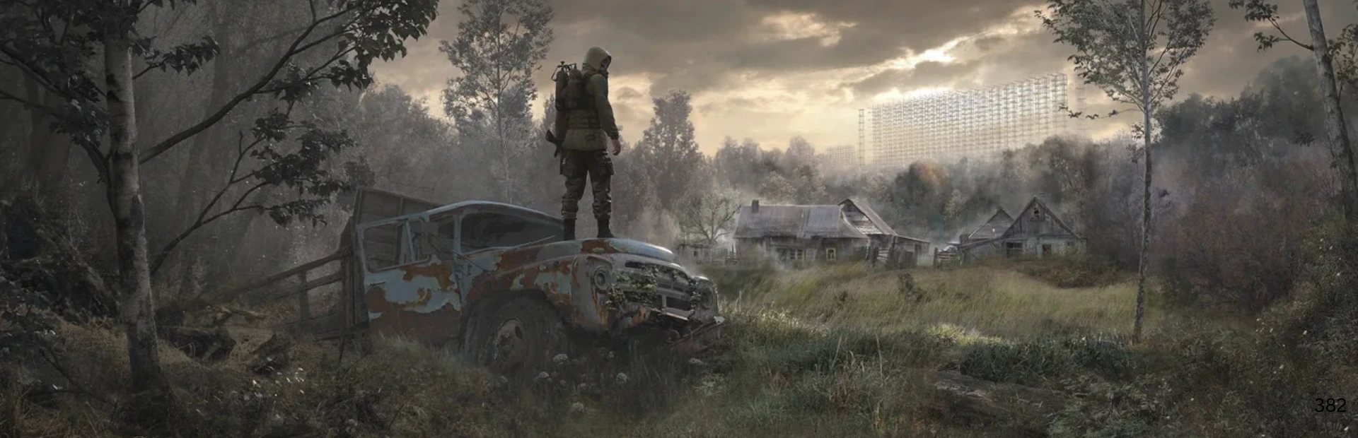 A lone stalker stands on a rusted truck overlooking an abandoned village in STALKER 2.