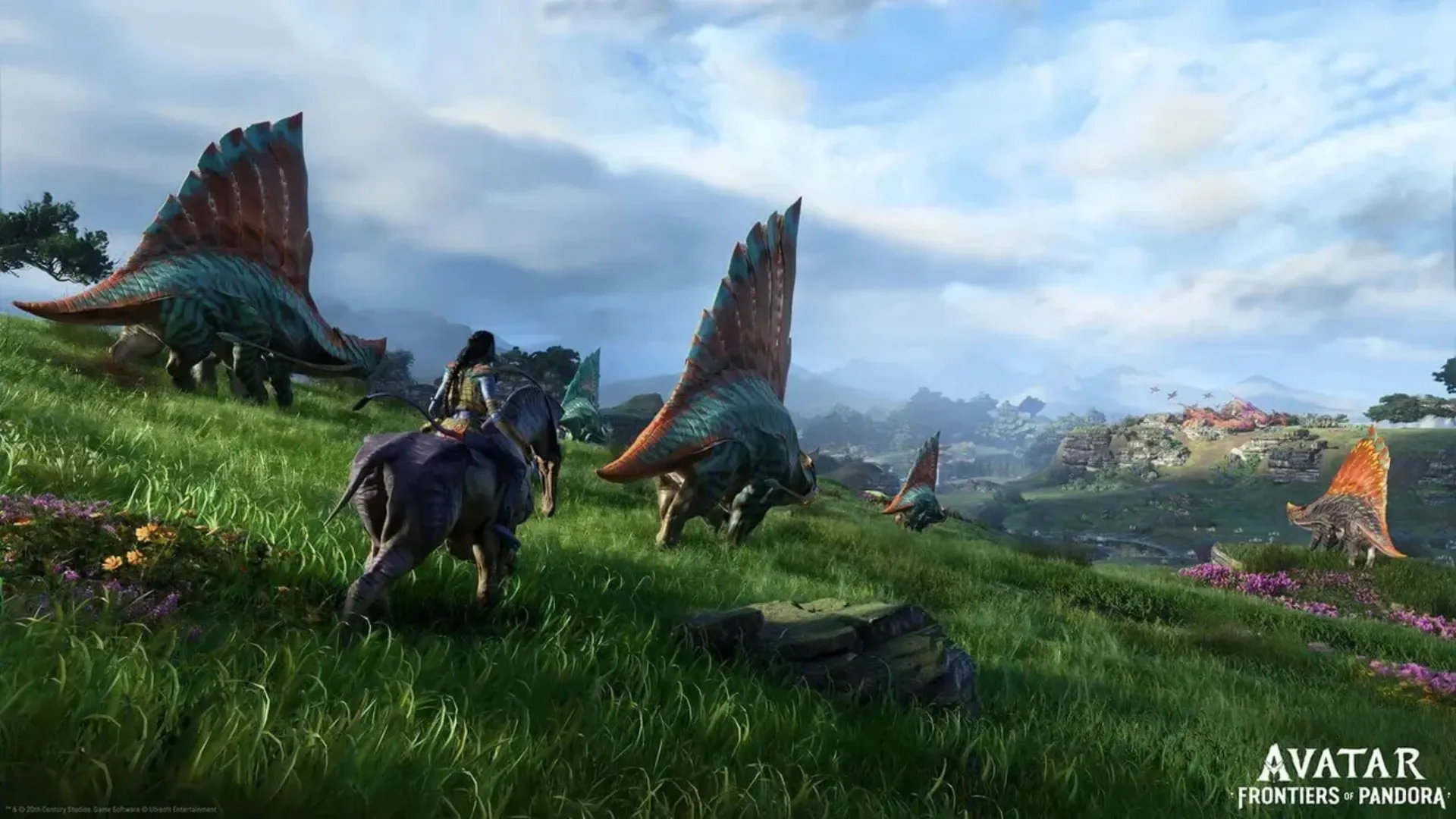 A Na'vi rides a mount across a lush green hillside past large finned creatures under a bright sky in Frontiers of Pandora.