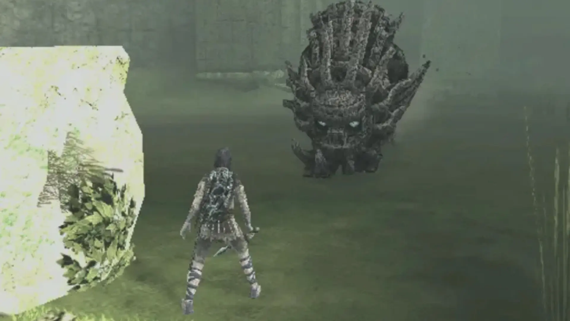 Wander faces one of the smaller colossi among the ruins in Shadow of the Colossus