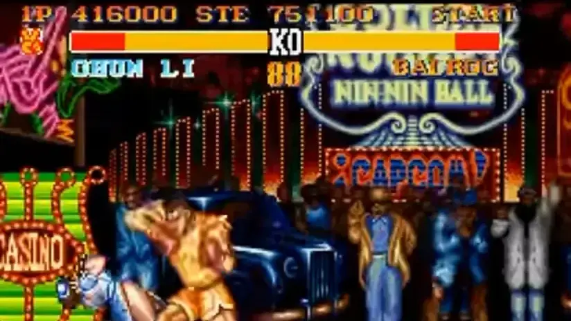 Chun-Li fights Balrog on the Las Vegas stage in Street Fighter II Turbo.