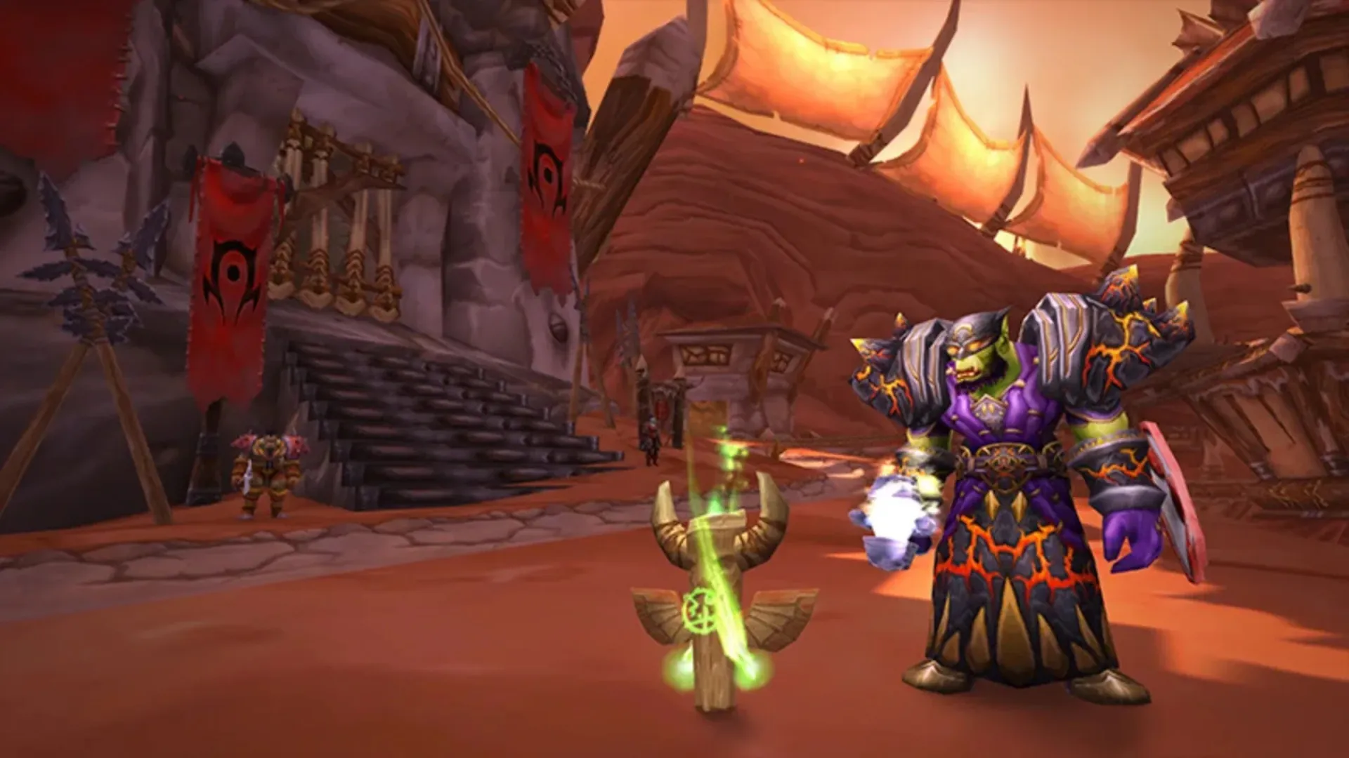 An orc in ornate purple and orange robes casts a spell beside a glowing shrine in a red-rock Horde city in WoW Classic.