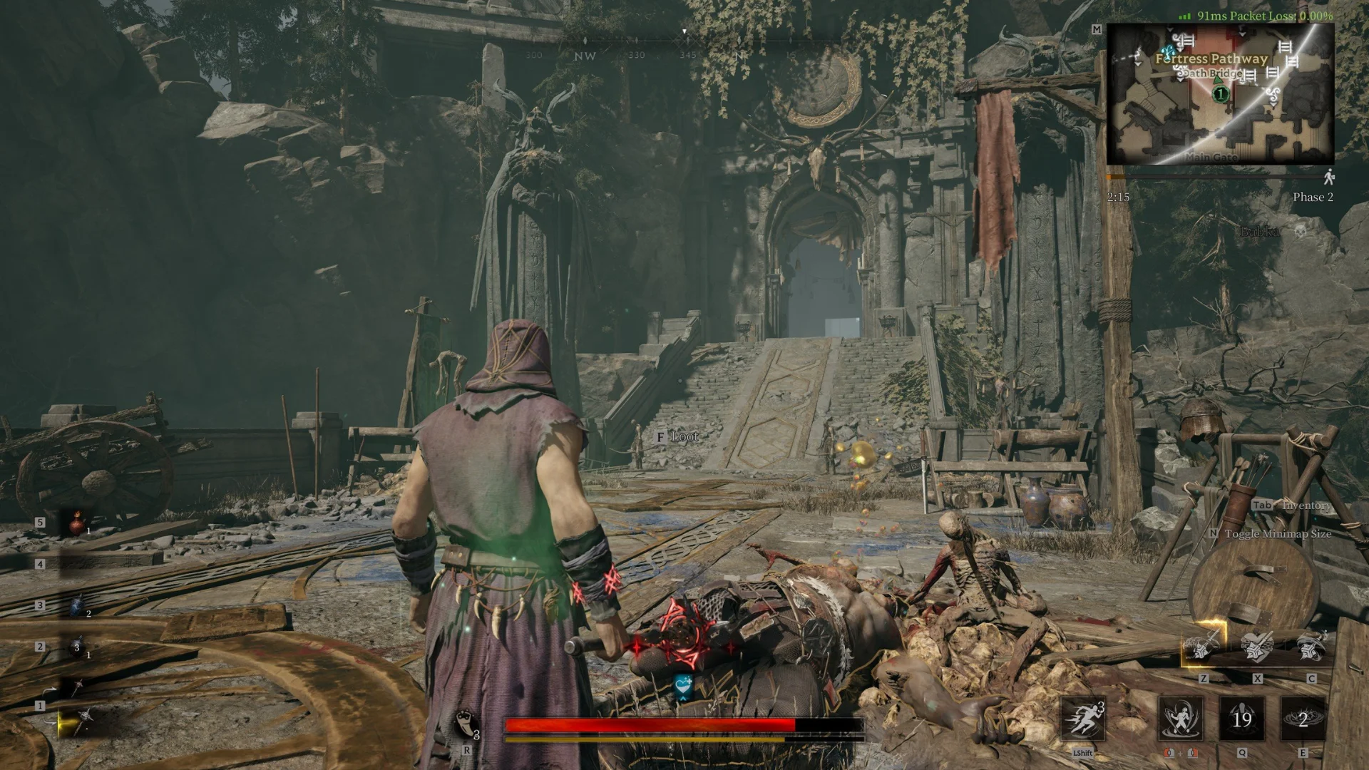 A Mistfall Hunter character stands beside defeated enemies near a ruined fortress entrance.
