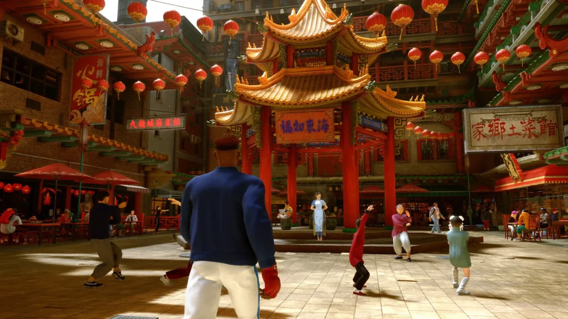 A player character explores a Chinatown district filled with lanterns in Street Fighter 6.