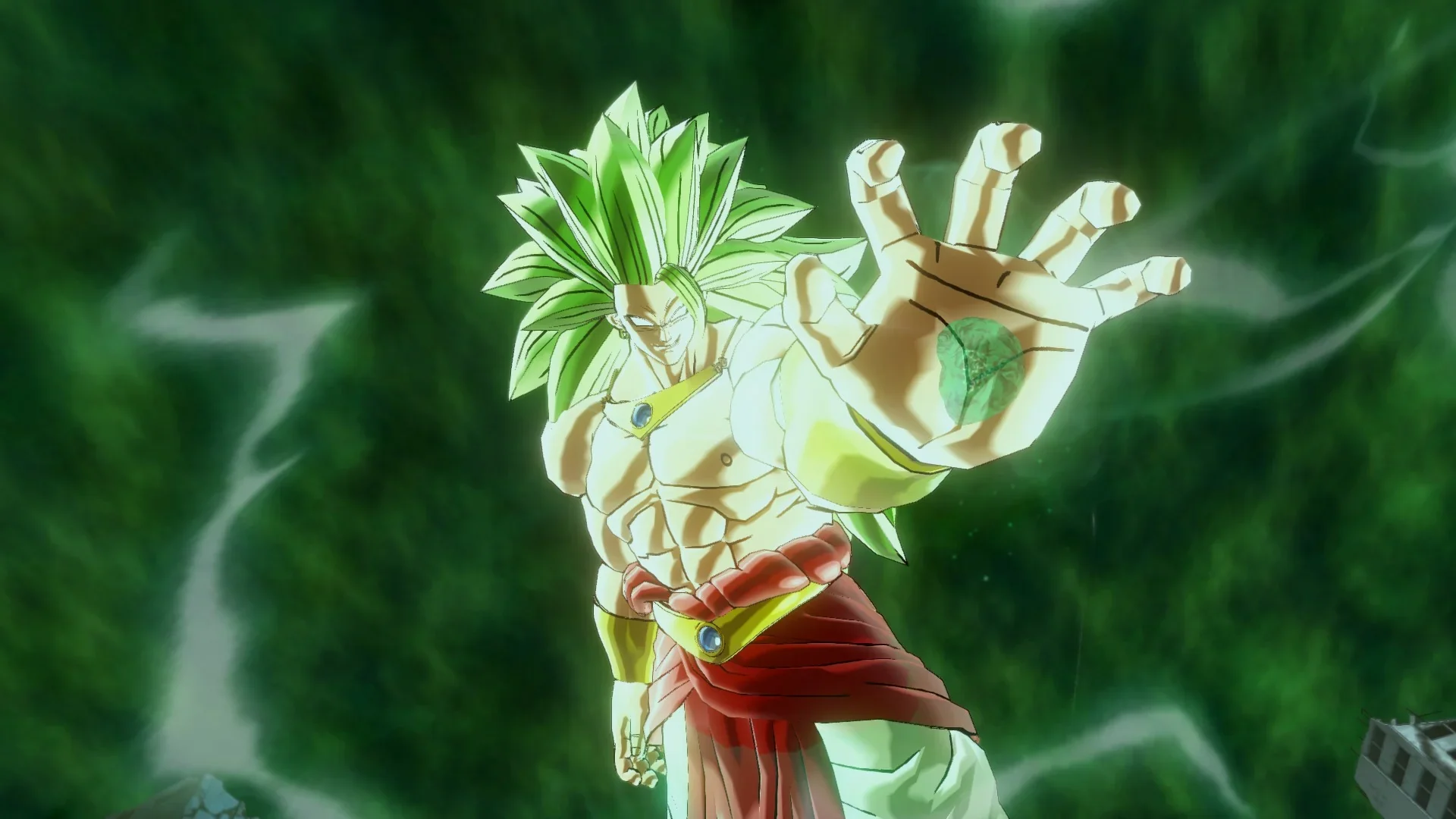 Full Power Super Saiyan Broly reaches forward while surrounded by a powerful green energy aura.