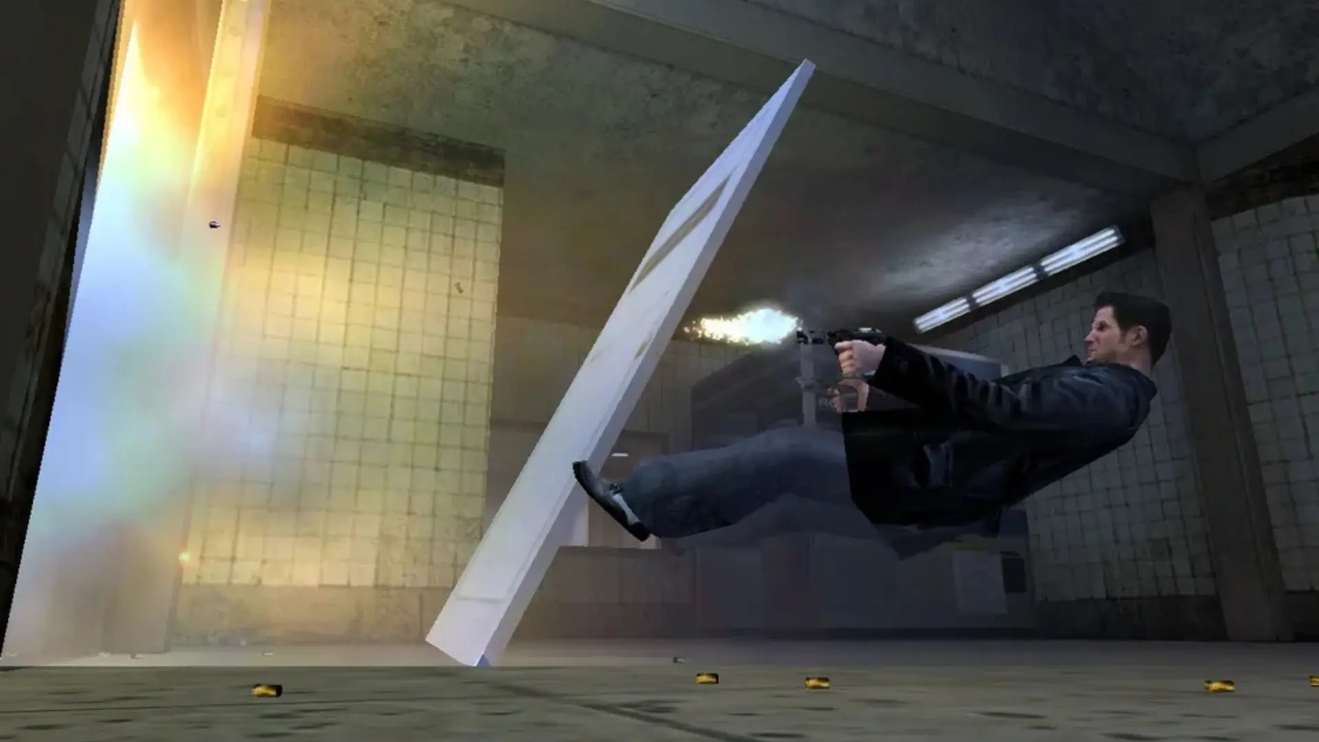 Max Payne dives through a doorway while firing his gun in bullet time.