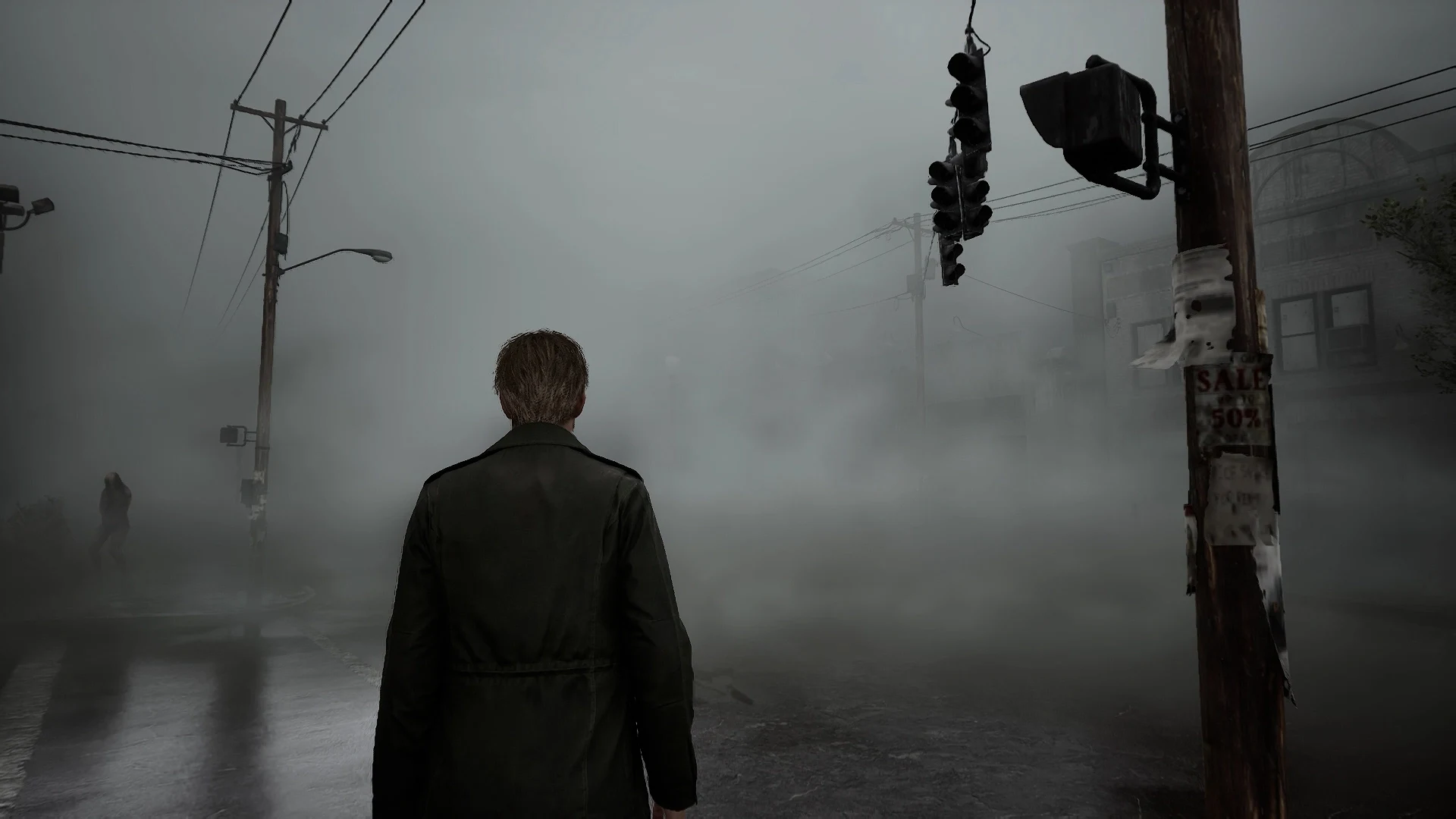 James Sunderland stands in a fog-covered street in the Silent Hill 2 remake
