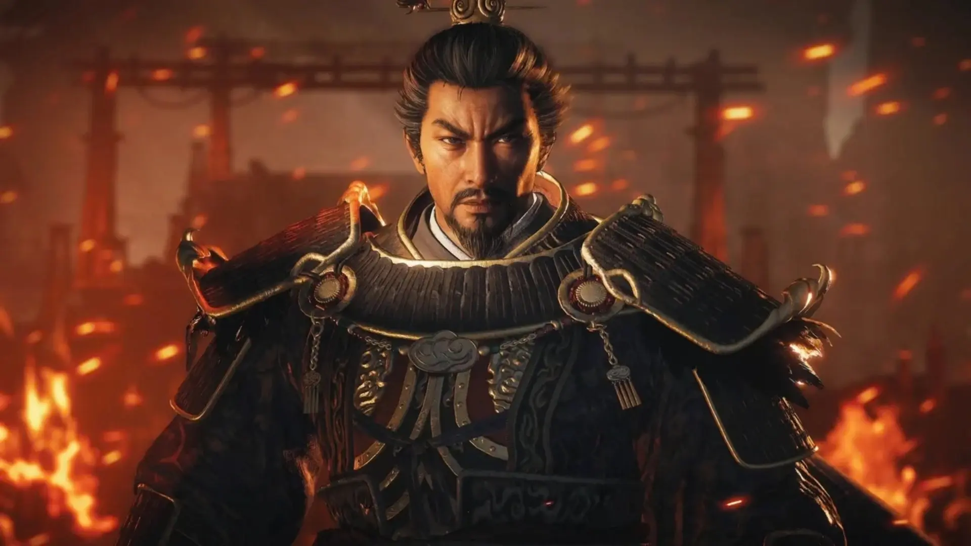An armored warrior stands amid fire and drifting embers in Wo Long 2: Wings of Ember