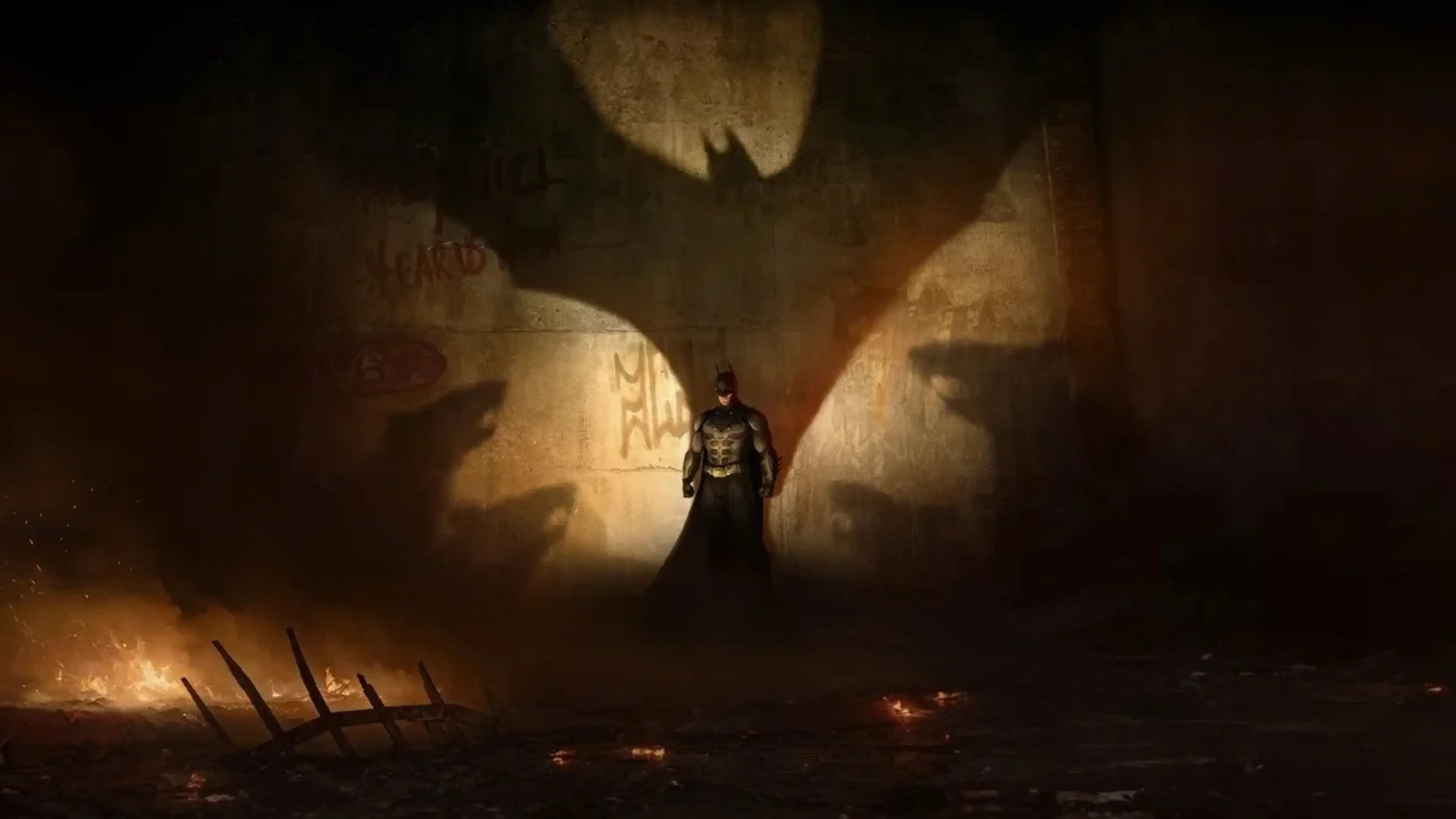 Batman stands beneath a giant bat-shaped shadow in Arkham Shadow