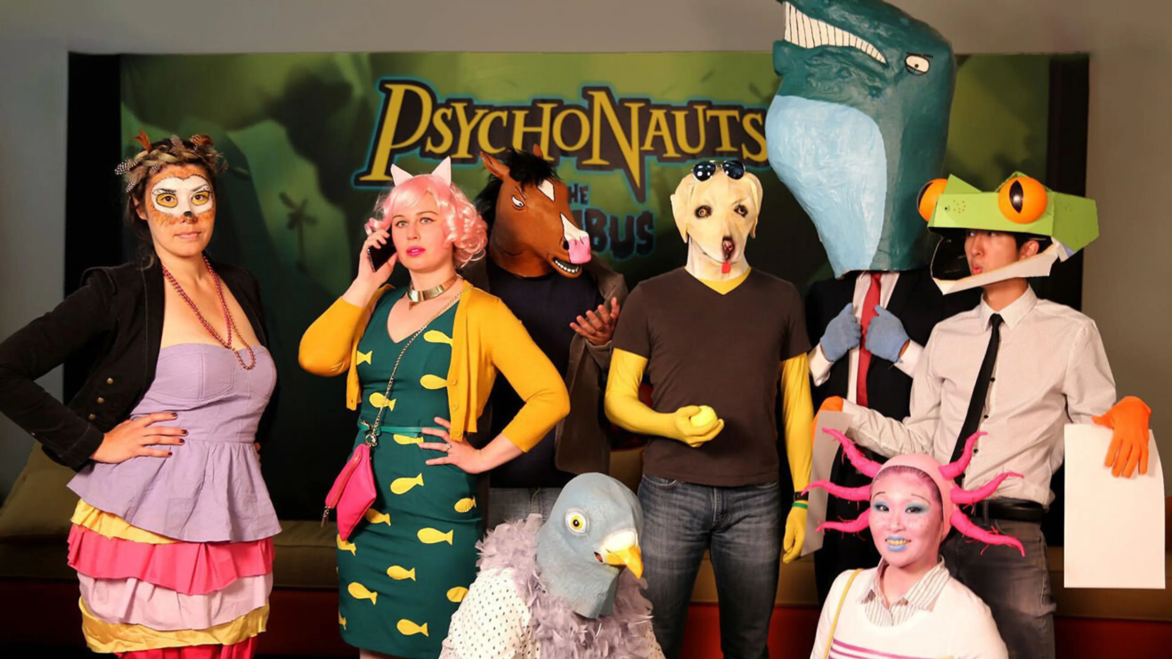Double Fine employees dressed in colorful Psychonauts-inspired costumes