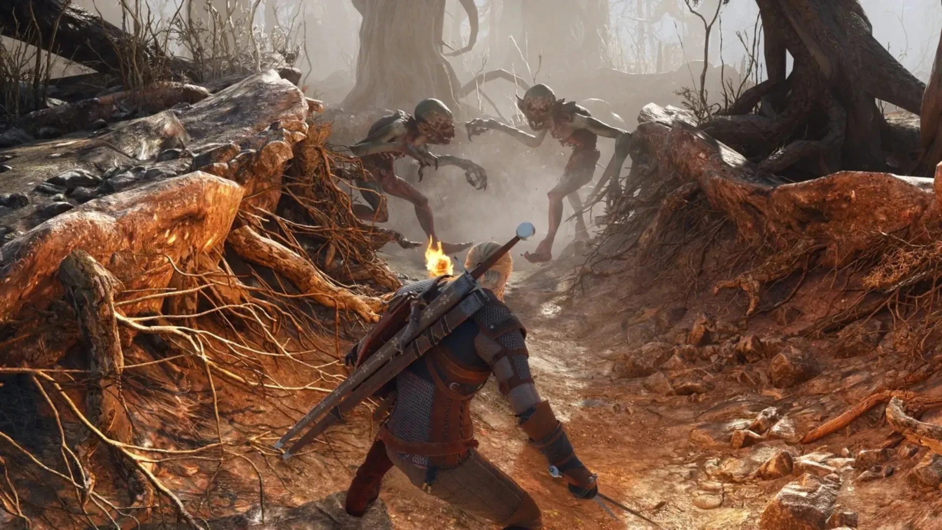 Geralt faces several monsters on a forest path in The Witcher 3 Remastered