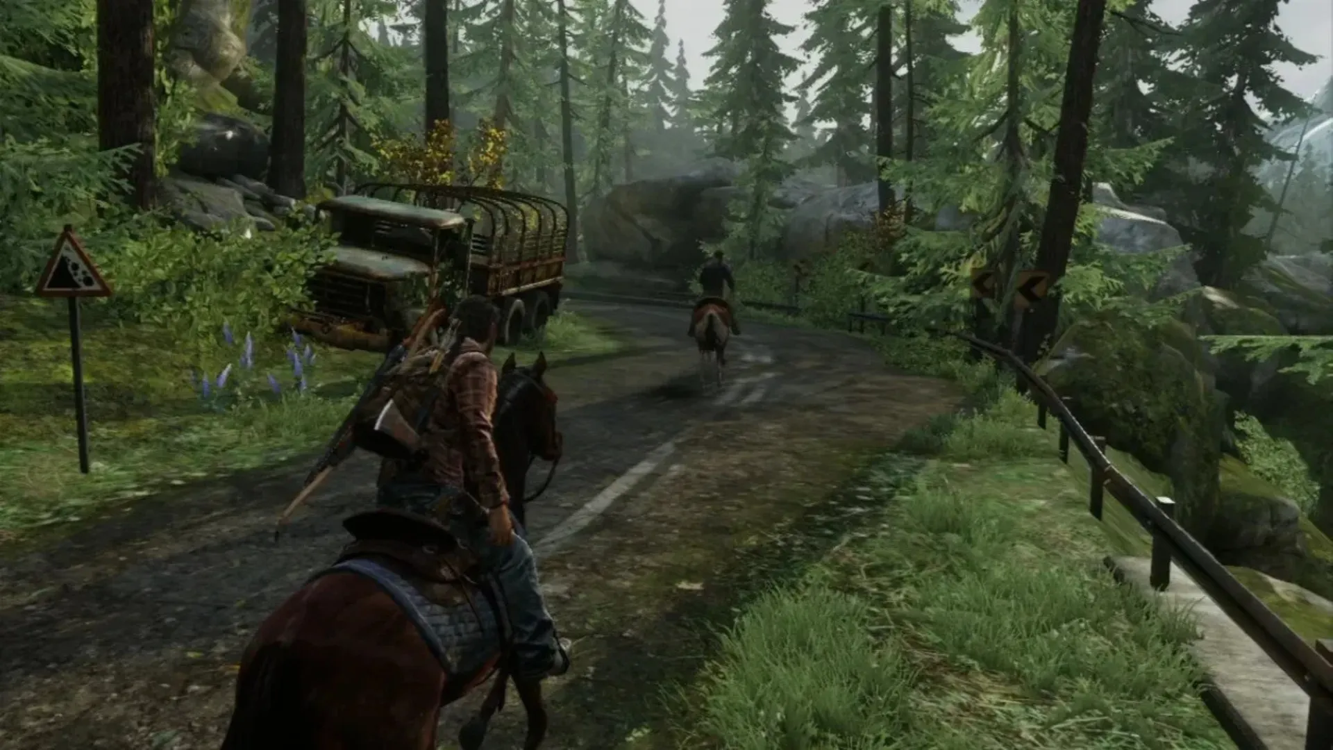 Joel rides a horse along a forest road in The Last of Us.