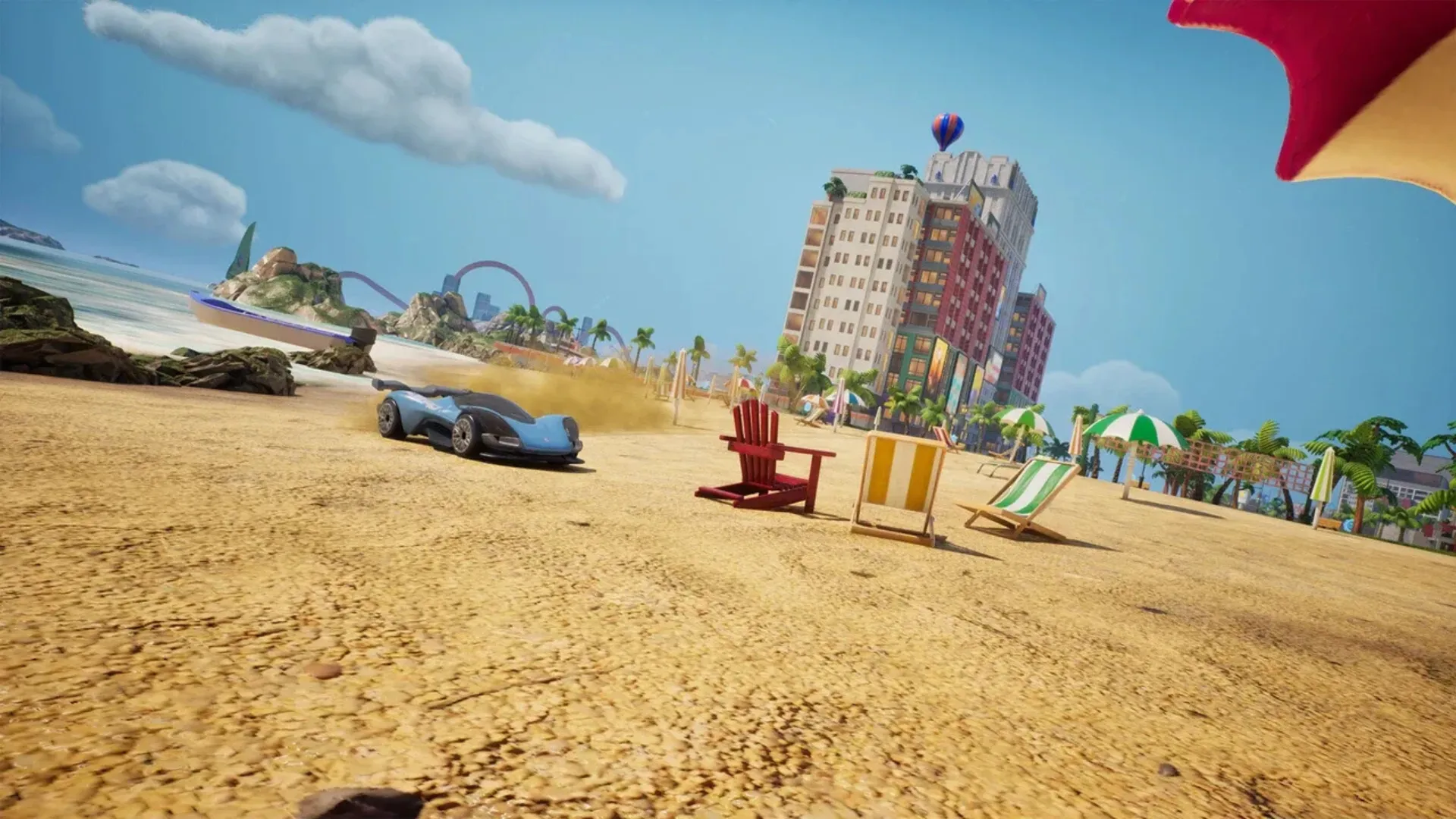 Hot Wheels car racing across a beach in Hot Wheels Infinite Rush