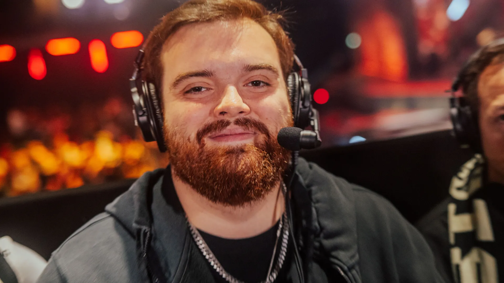 Close-up of Ibai Llanos wearing a headset at a live esports event