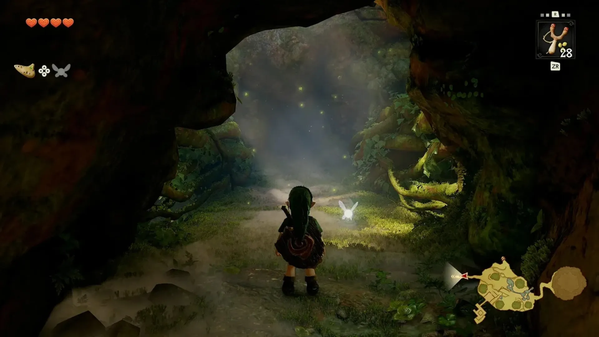 Young Link exploring a forest cave in the Ocarina of Time remake