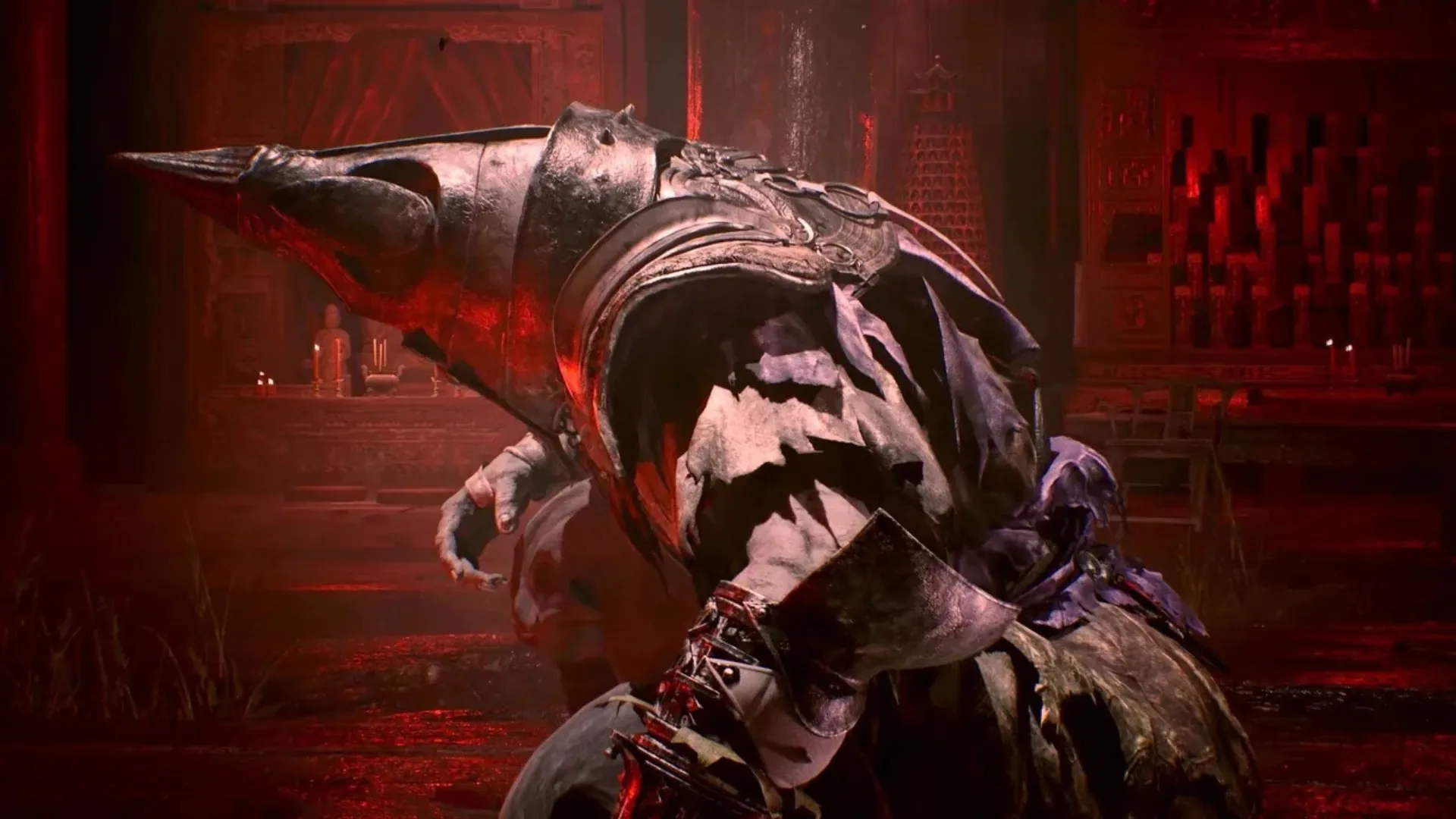 A heavily armored enemy leans forward inside a red-lit interior in Phantom Blade Zero