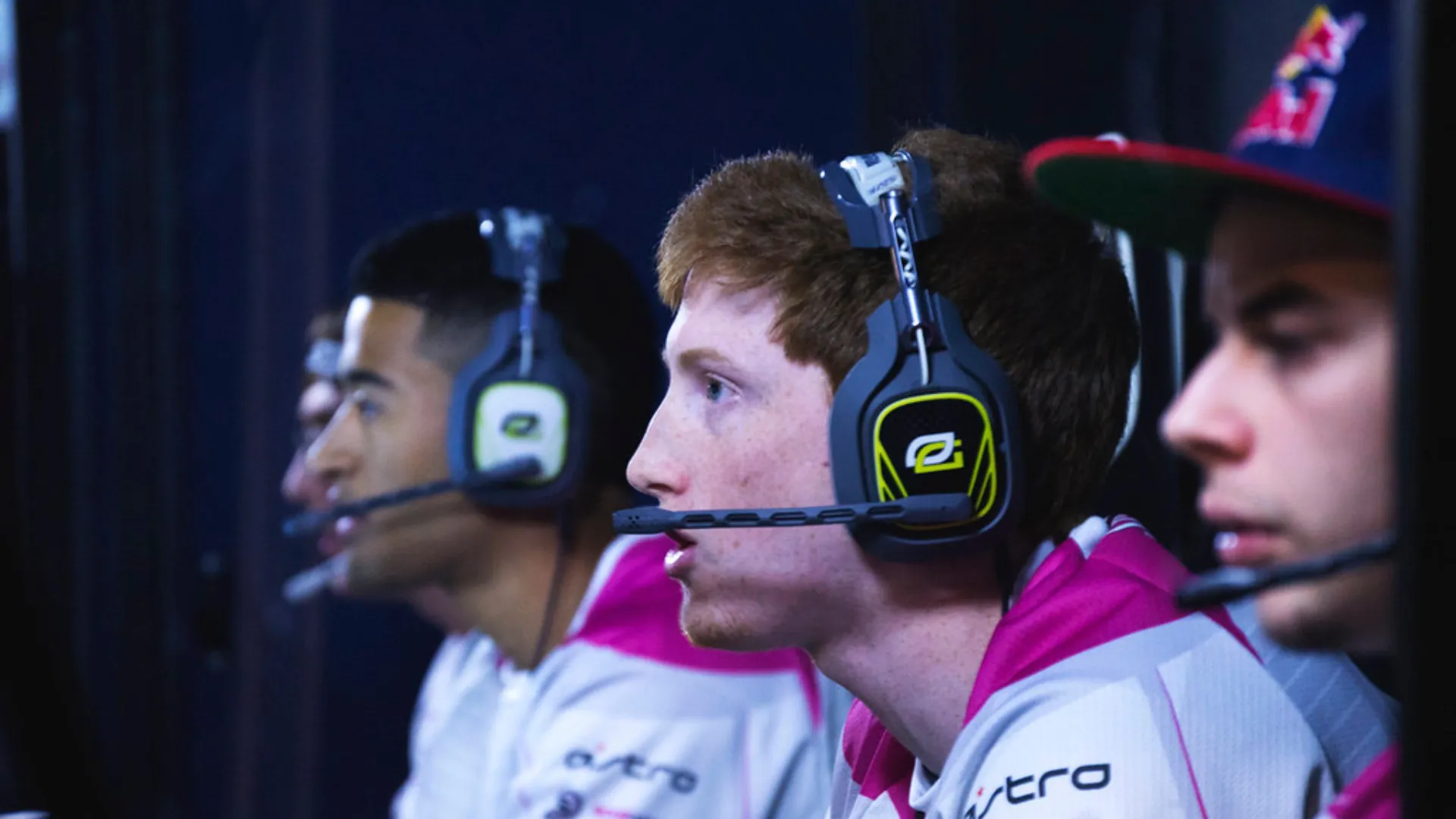 Scump wearing an OpTic Gaming jersey and headset during a Call of Duty esports event.