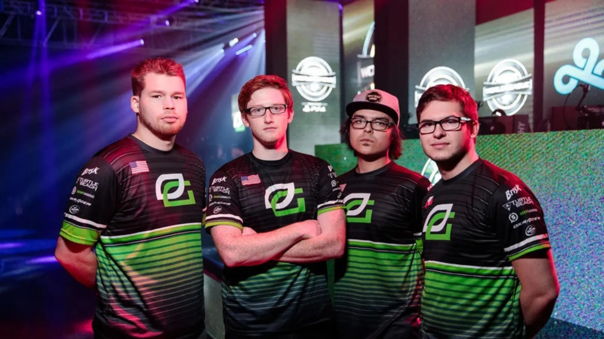 Scump and his OpTic Gaming teammates posing together at a Call of Duty esports event.