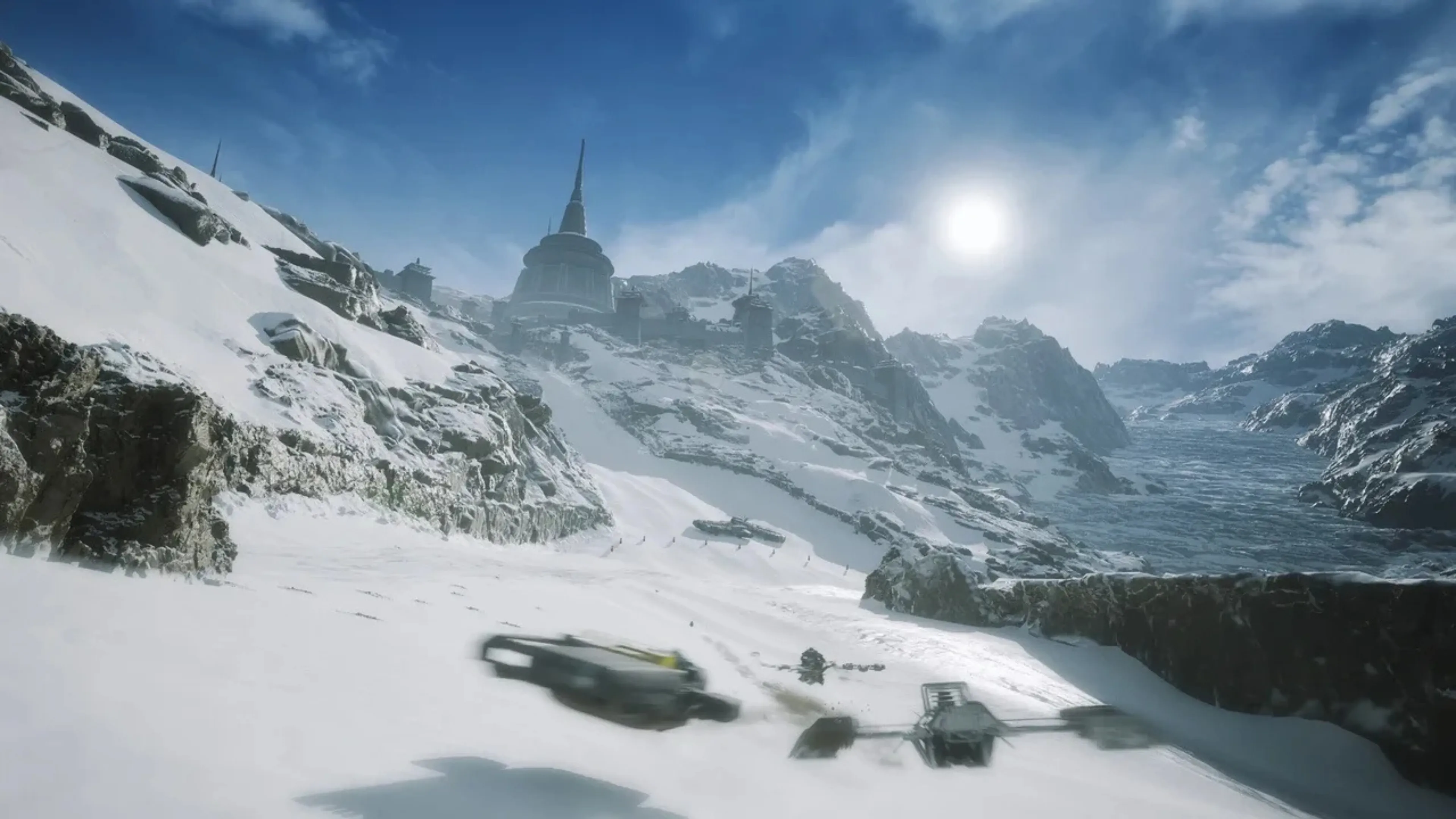 Racers speed across a snowy mountain track in Star Wars: Galactic Racer