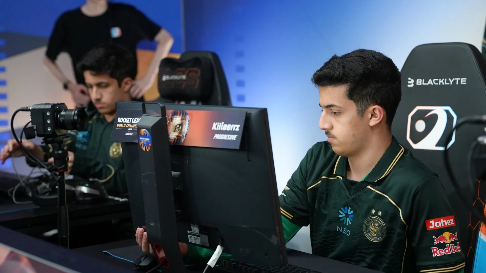 Team Falcons players compete at their PCs during the 2026 Rocket League World Championship