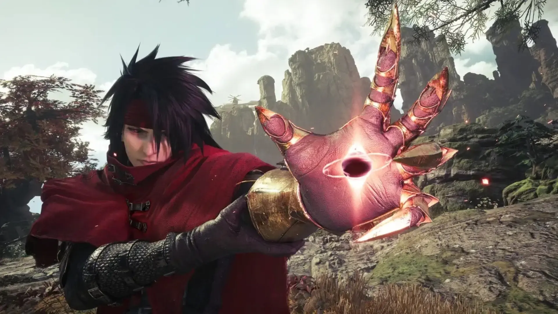 Vincent Valentine extends a glowing hand in a rocky landscape in Final Fantasy VII Revelation