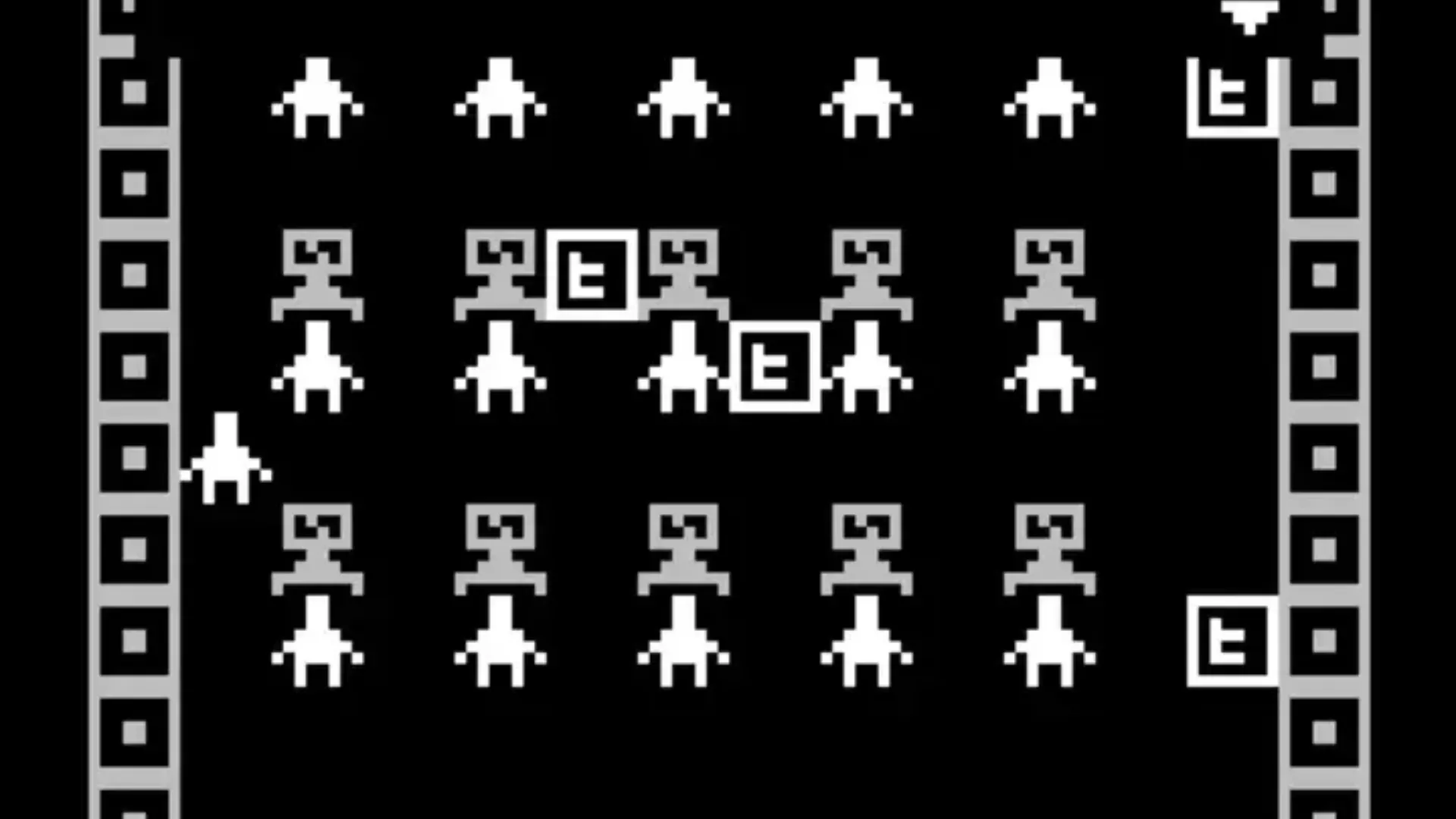 Black-and-white retro game screen featuring rows of pixelated alien figures and geometric symbols.