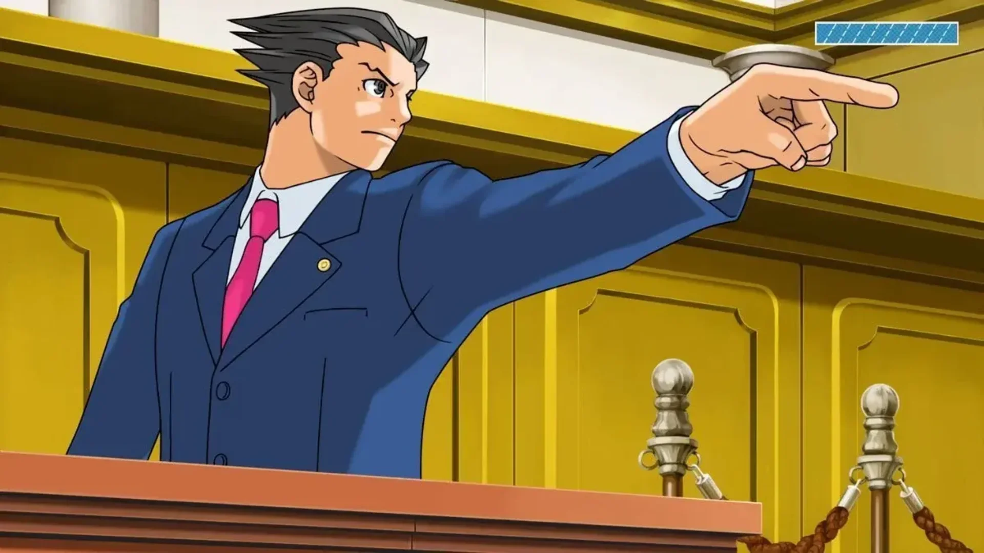 Phoenix Wright points across the courtroom during a trial in Ace Attorney: Dual Destinies VR.